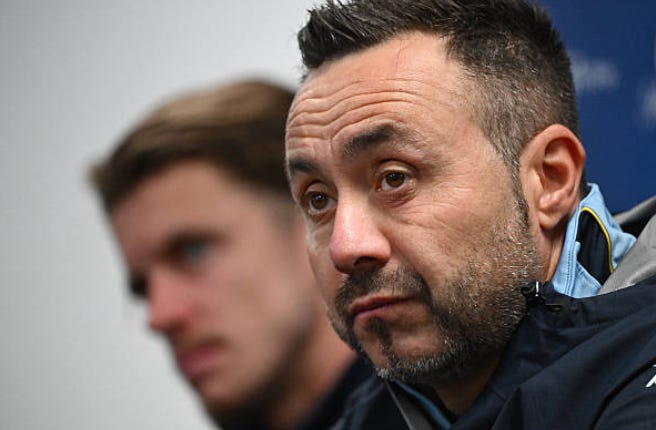 Tottenham Hotspur's head coach Roberto De Zerbi (R) and player Conor Gallagher attend a press conference after a training session at Allianz Stadium in Sydney on July 31, 2026, ahead of a pre-season friendly against Chelsea. (Photo by SAEED KHAN / AFP via Getty Images) 