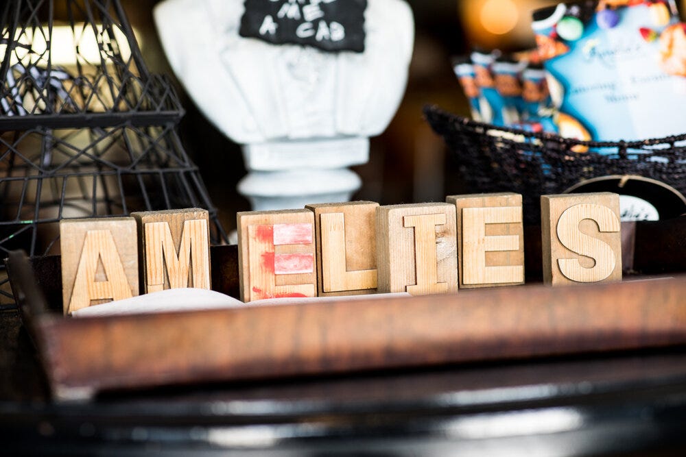 Wooden blocks near the entrance of Amélie’s Bakery.