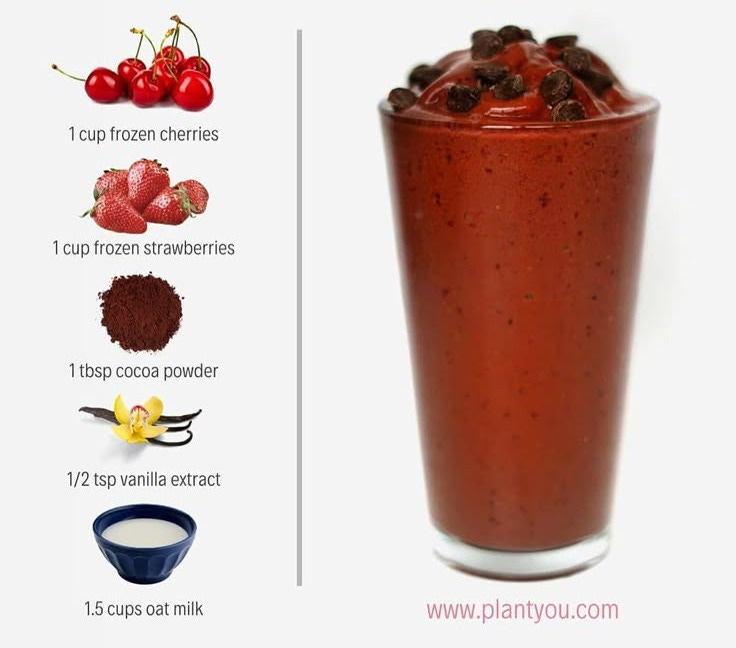 This may contain: a red velvet cake smoothie in a tall glass with chocolate chips and cherries