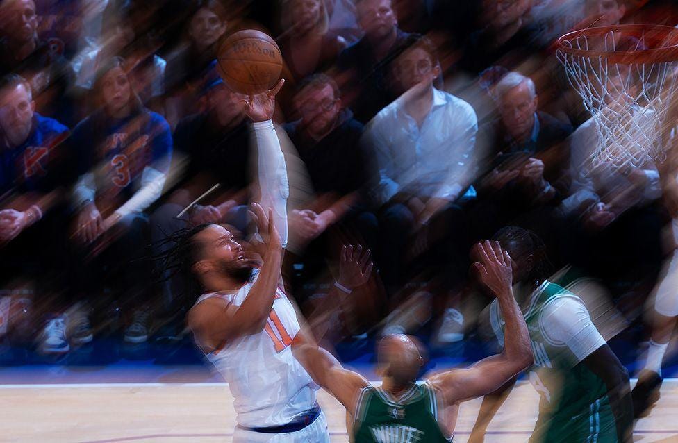 A slightly blurred Jalen Brunson of the New York Knicks puts up a shot during their 4-2 series victory over defending champions the Boston Celtics in the NBA play-offs. Photo by Al Bello.