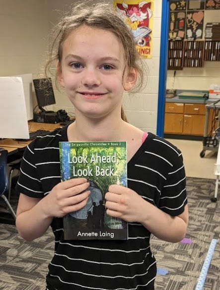 Kids holding books