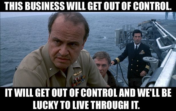 A person in uniform on a boat

Description automatically generated