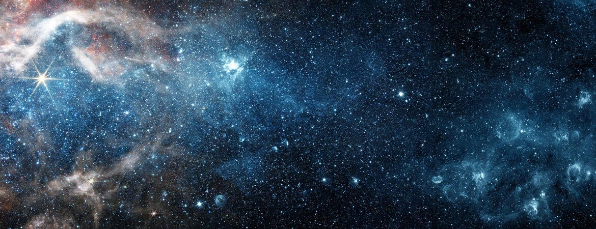 An image of space filled with stars, galaxies, and a nebula. An image of space filled with stars, galaxies, and a nebula.