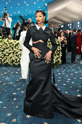 Image may contain Mickey Guyton Person Adult Accessories Bracelet Jewelry Clothing Footwear Shoe Wedding and Ring