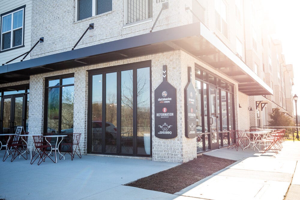 Front view of Chattahoochee Coffee Co. at the Eddy. One can enter through two set of entrances into the coffee shop.