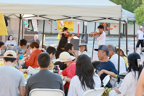 People at the Chinatown Memorial Plaza