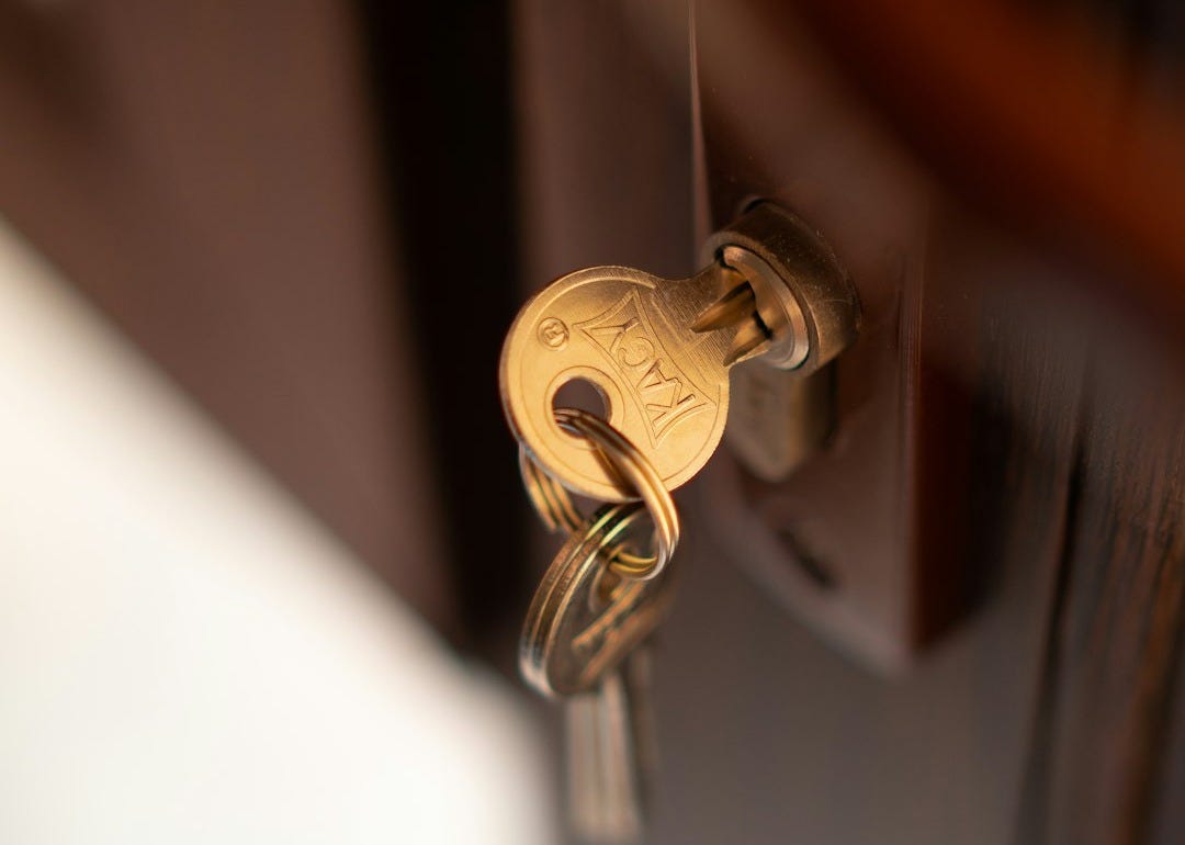 a close up of a key on a door