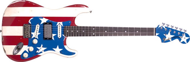 Red, white, and blue American flag design on a Fender Wayne Kramer Signature (MC5) guitar, symbolizing patriotism.