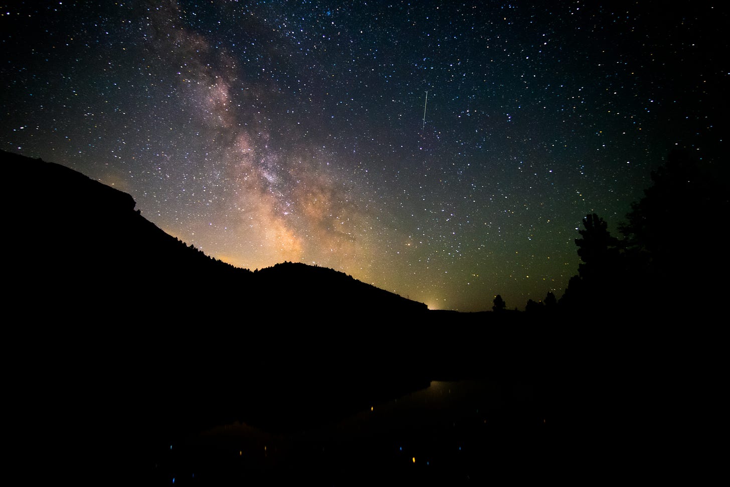 Milky Way sky with a slightly mountainous foreground