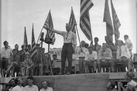 Major General Smedley Butler addresses nearly 16,000 veteran bonus marchers camped in Washington, D.C., July 20, 1932. Smedley urged them to stay until the bonus has been paid. (AP Photo)