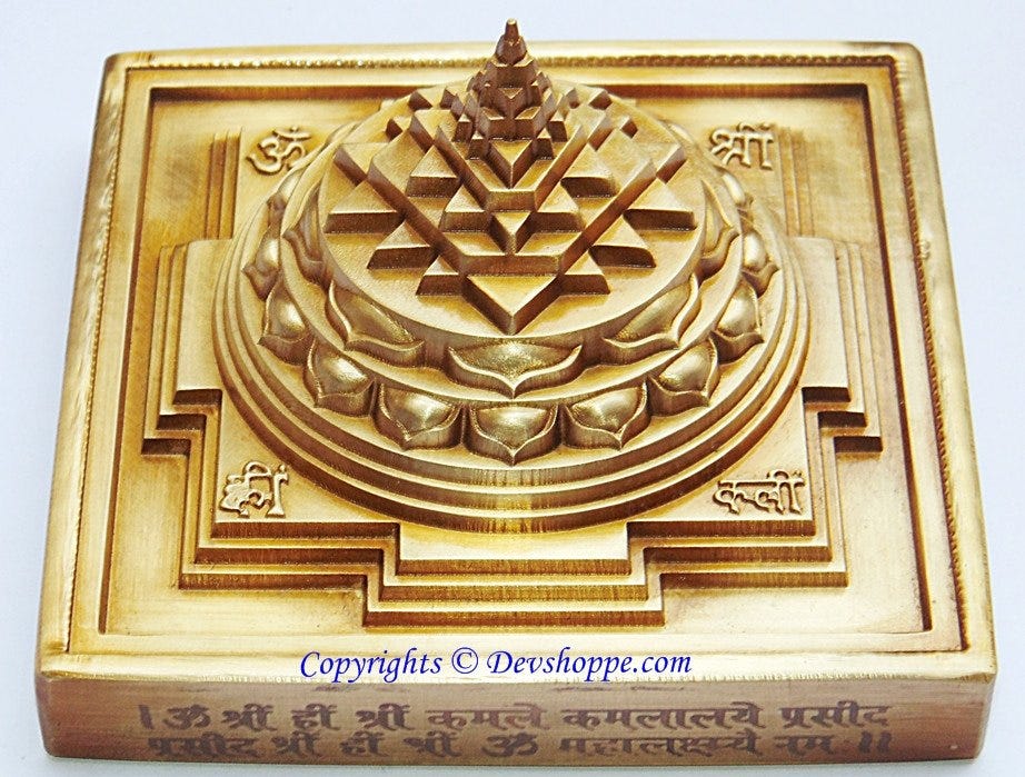 https://cdn.shopify.com/s/files/1/1328/9161/products/yantras-pick-of-the-day-others-brass-3d-maha-meru-yantra-sriyantra-single-piece-no-joints-no-screws-perfect-diagram-1.jpeg?v=1623191594