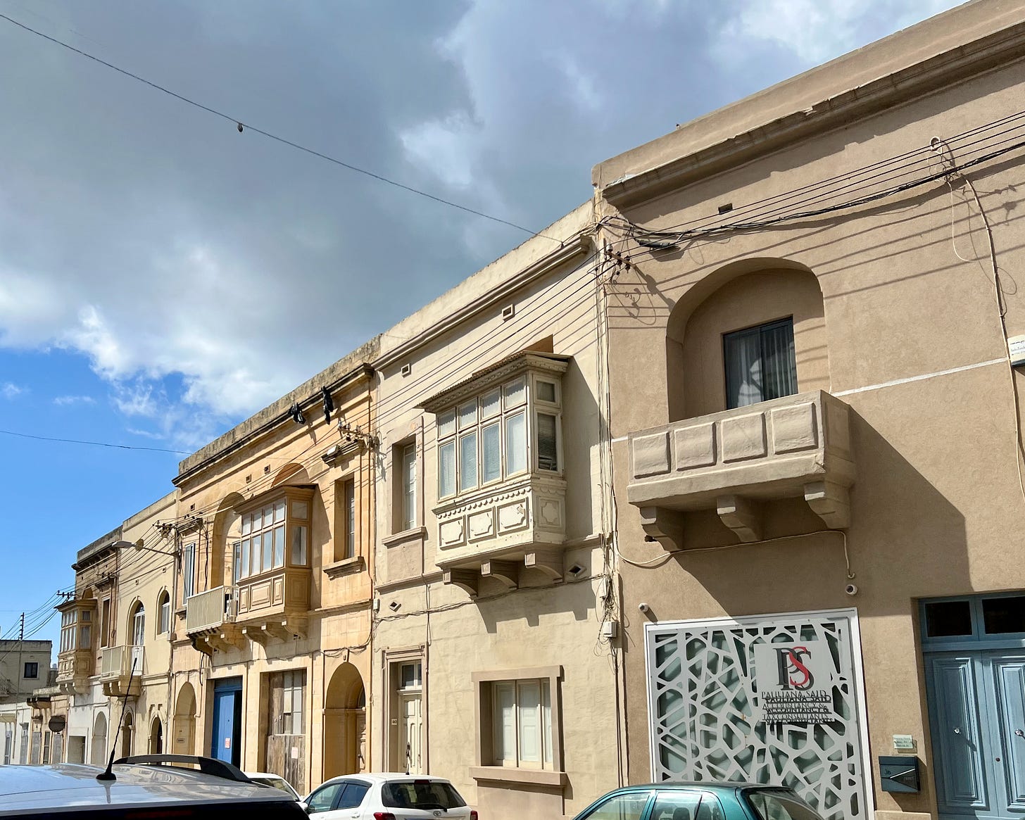 A mix of open and closed balconies in Malta (Photo by © Marie Powell)