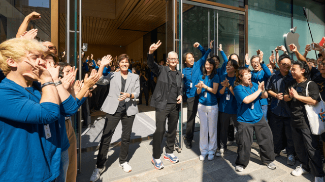 Apple CEO Tim Cook and Apple's Senior Vice President of Retail Deirdre O'Brien celebrate the grand reopening of Apple Ginza in Tokyo, Japan