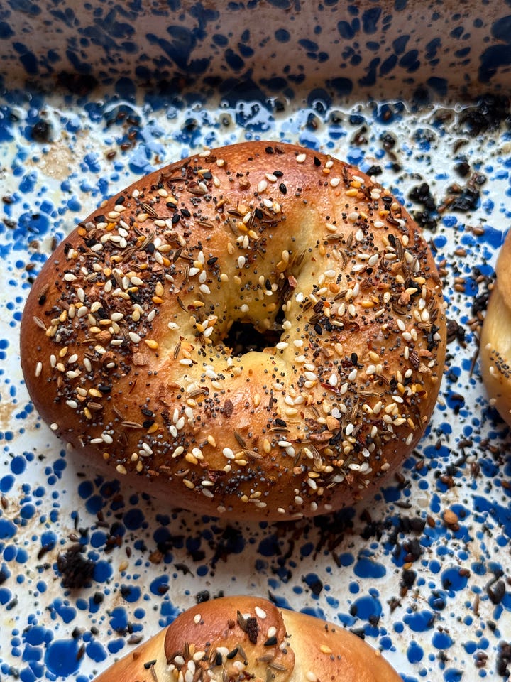 two photos of bagels, one with everything seasoning and one with flakey salt