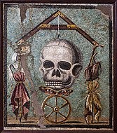 Roman mosaic representing the Wheel of Fortune which, as it turns, can make the rich poor and the poor rich; in effect, both states are very precarious, with death never far and life hanging by a thread: when it breaks, the soul flies off. And thus are all made equal. (Collezioni pompeiane. Museo Archeologico Nazionale di Napoli) Roman mosaic representing the Wheel of Fortune which, as it turns, can make the rich poor and the poor rich; in effect, both states are very precarious, with death never far and life hanging by a thread: when it breaks, the soul flies off. And thus are all made equal. (Collezioni pompeiane. Museo Archeologico Nazionale di Napoli)