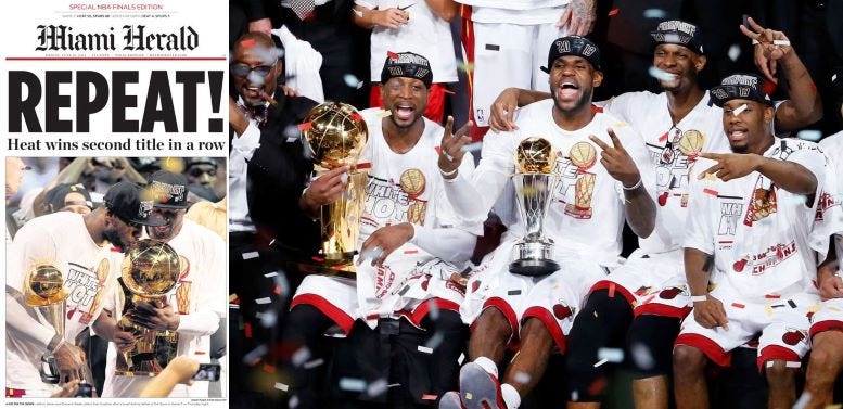 The Miami Herald headline and Dwayne Wade, Lebron James, Chris Bosh and teammates after Game 7 victory. The Miami Herald headline and Dwayne Wade, Lebron James, Chris Bosh and teammates after Game 7 victory.