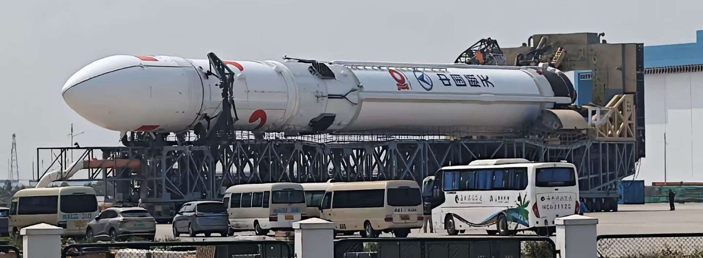 The Long March 10B Y1 vehicle being taken through the Wenchang Commercial Space Launch Site atop of its transporter-erector. The Long March 10B Y1 vehicle being taken through the Wenchang Commercial Space Launch Site atop of its transporter-erector.