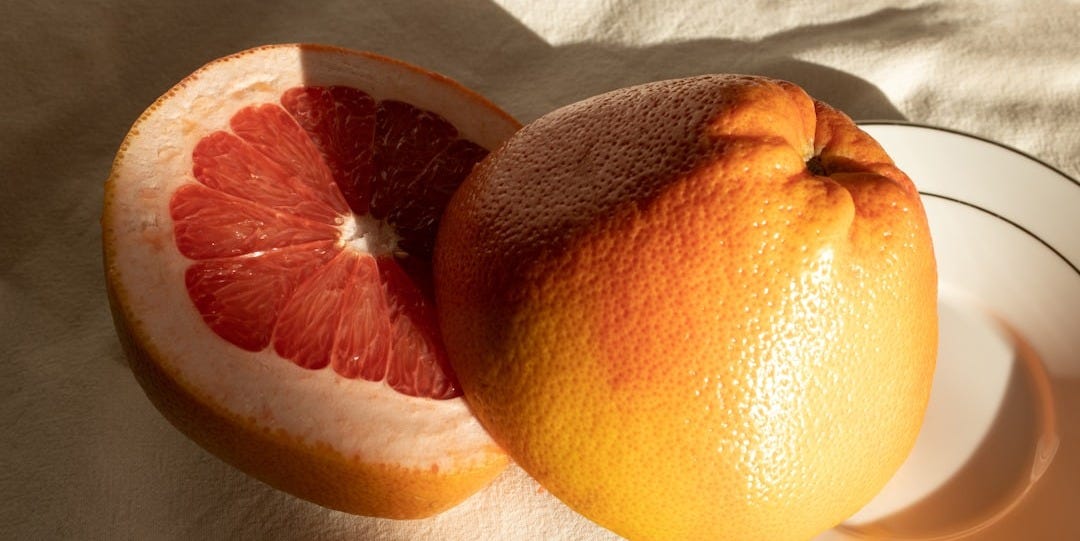 a fruit cut in half a fruit cut in half