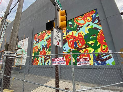 Series of nine photos depicting the evolution of my mural "Bound Together" located at 10th and Callowhill Streets in Philadelphia's Chinatown area.