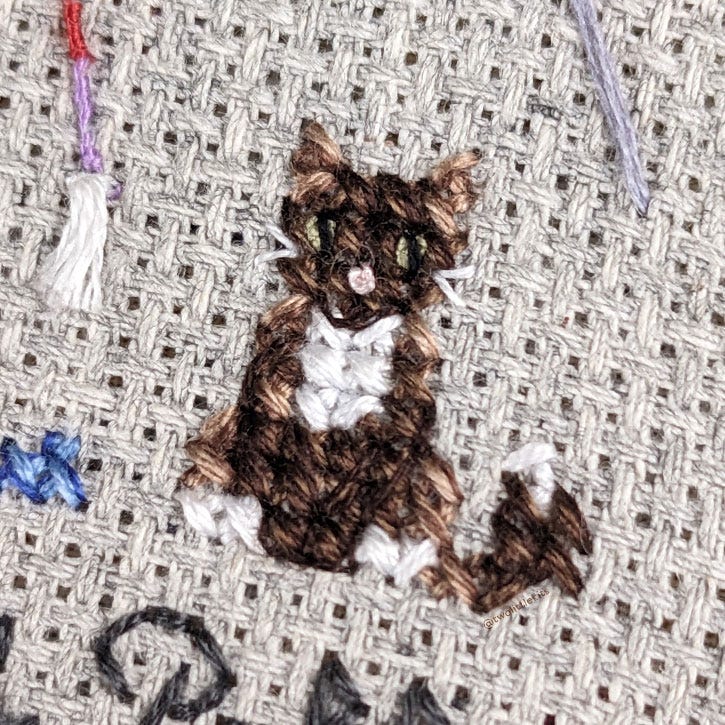 A close-up photograph of a sweet tabby cat, with their distinct mottled-looking fur. Created by tweeding flosses. A close-up photograph of a sweet tabby cat, with their distinct mottled-looking fur. Created by tweeding flosses.