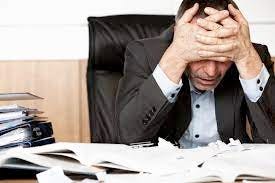Man with his head in his hands