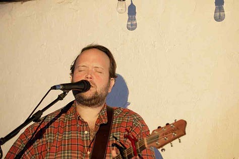 Clint Vines, Colton Sanders, and Jay Burnam perform in the loft at Iron Society, July 25th, 2025