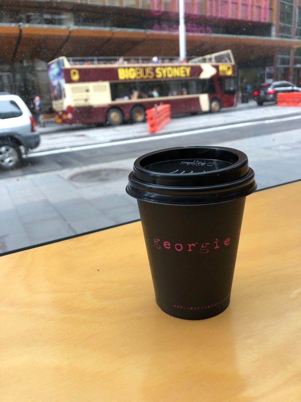 A black coffee cup on a table
Description automatically generated A black coffee cup on a table
Description automatically generated