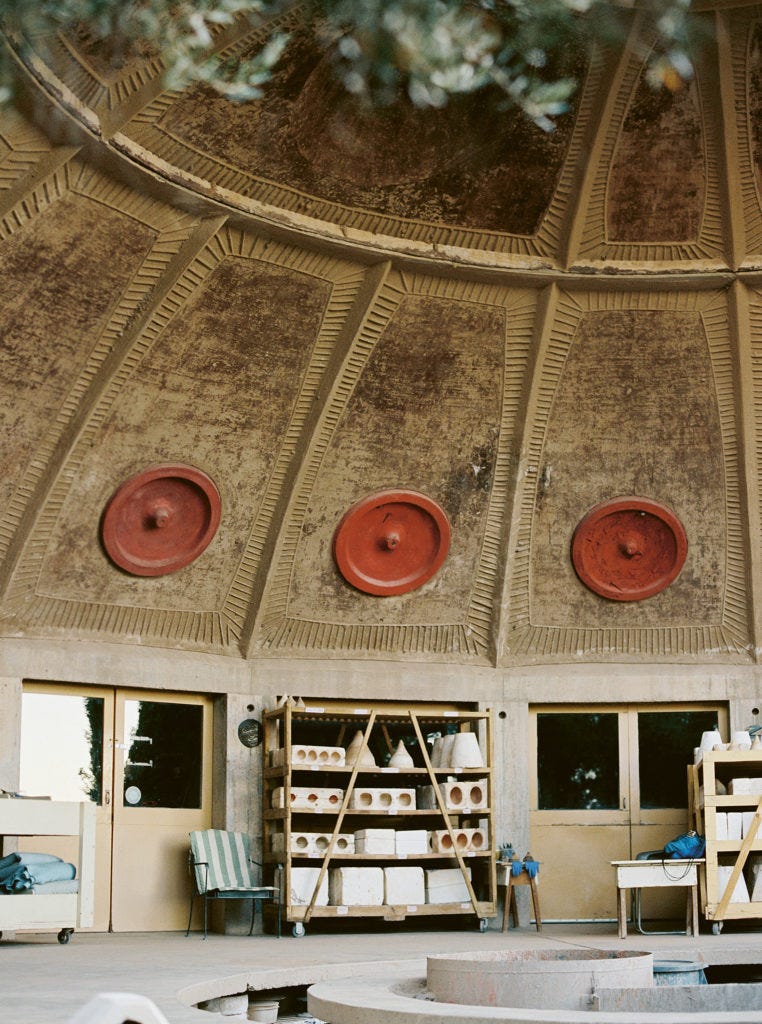 An idyllic scene of a pottery workshop at Arcosanti