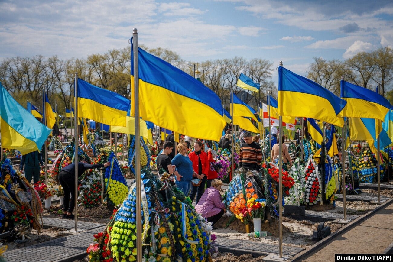 Relatives visit the grave of a Ukrainian soldier in a cemetery in Brovary, just outside Kyiv, in April 2023. Relatives visit the grave of a Ukrainian soldier in a cemetery in Brovary, just outside Kyiv, in April 2023. 
