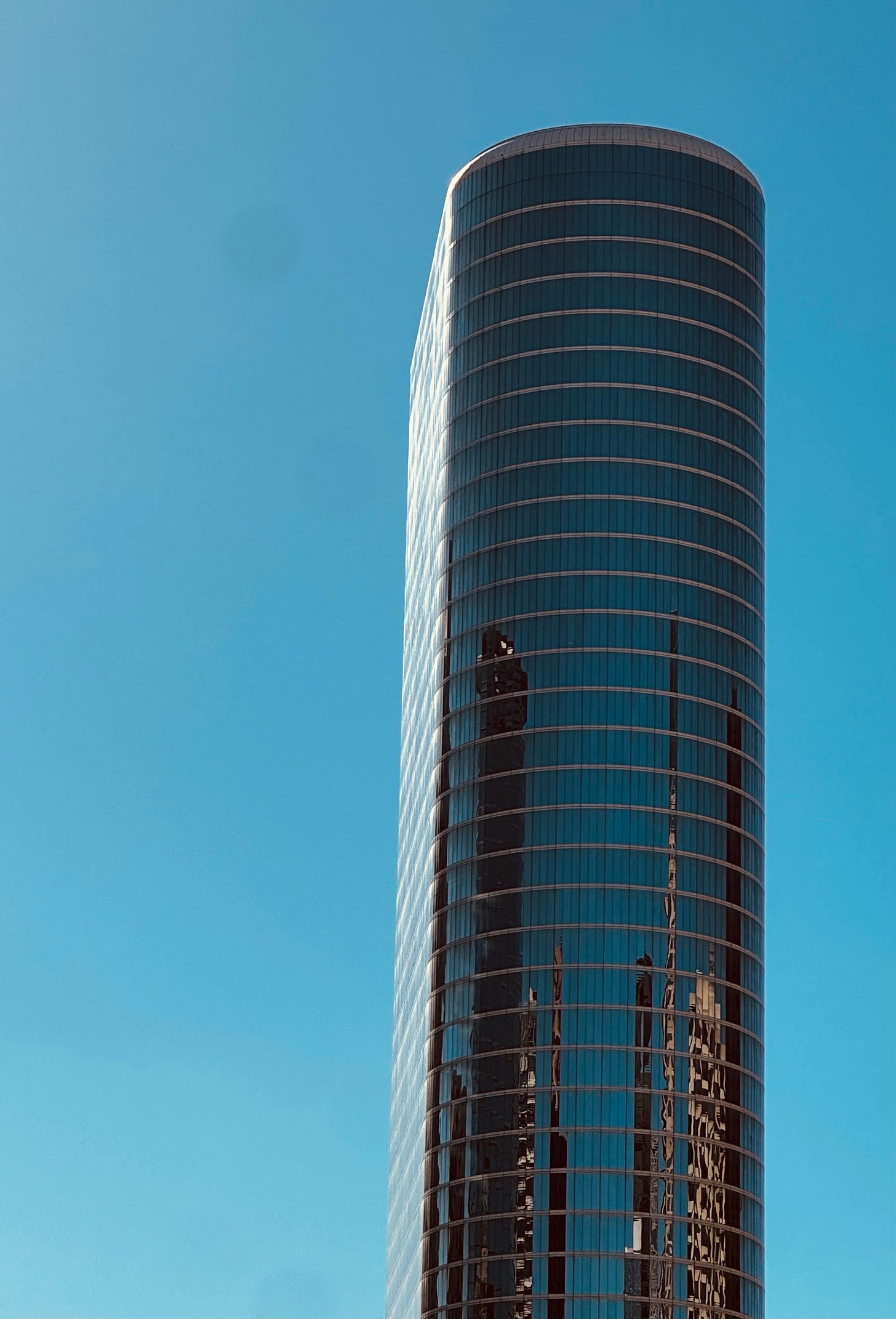 Enron building, a glass and steel Houston skyscraper with curved form Enron building, a glass and steel Houston skyscraper with curved form