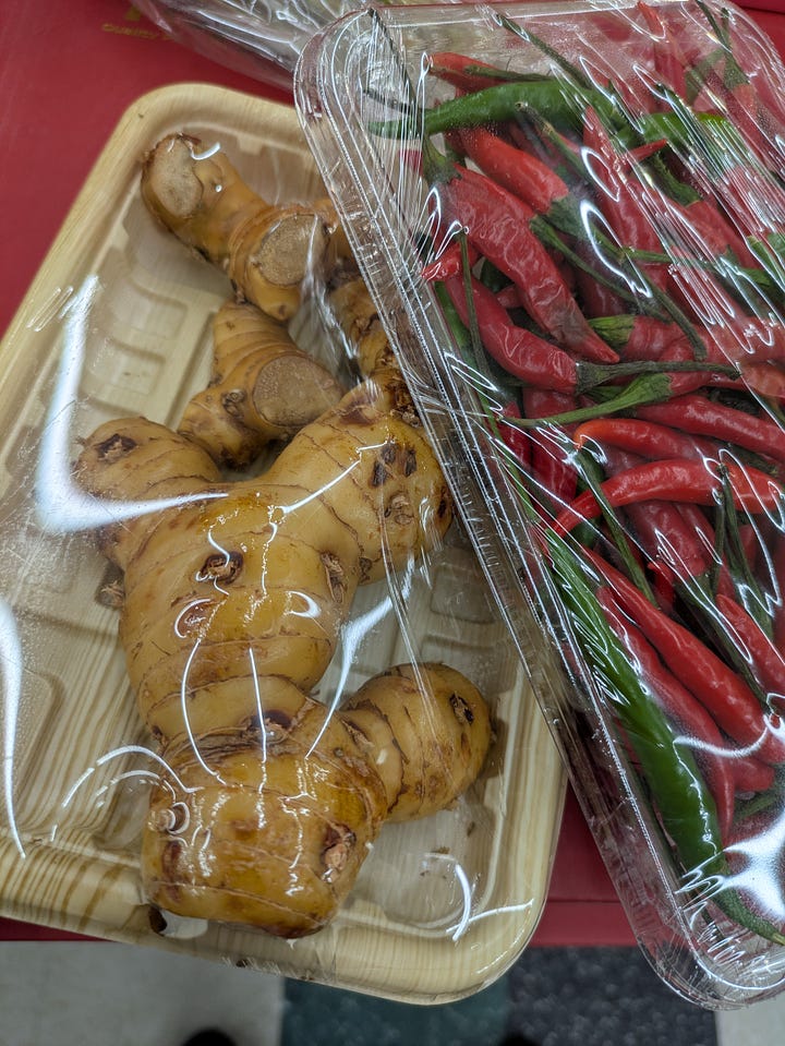 Makrut lime with leaves, photo by C hystrix via Unsplash. Galangal and thai chilies I bought at H-mart.