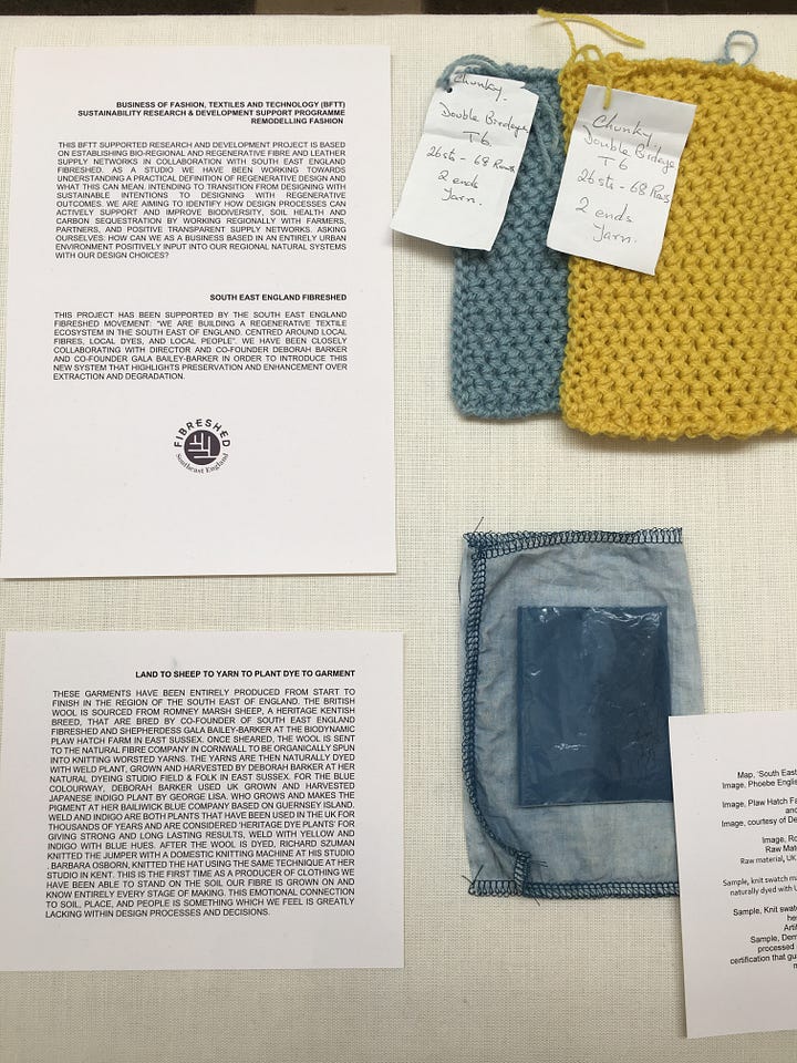 Photos that show the work the Phoebe English studio has done to support bioregional fibre production. A naturally-dyed weld jumper knitted using biodynamically-farmed British wool is on show alongside textile samples and plants..