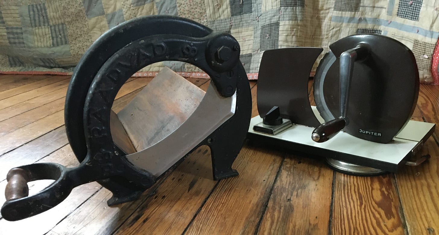 Two home bread slicers.