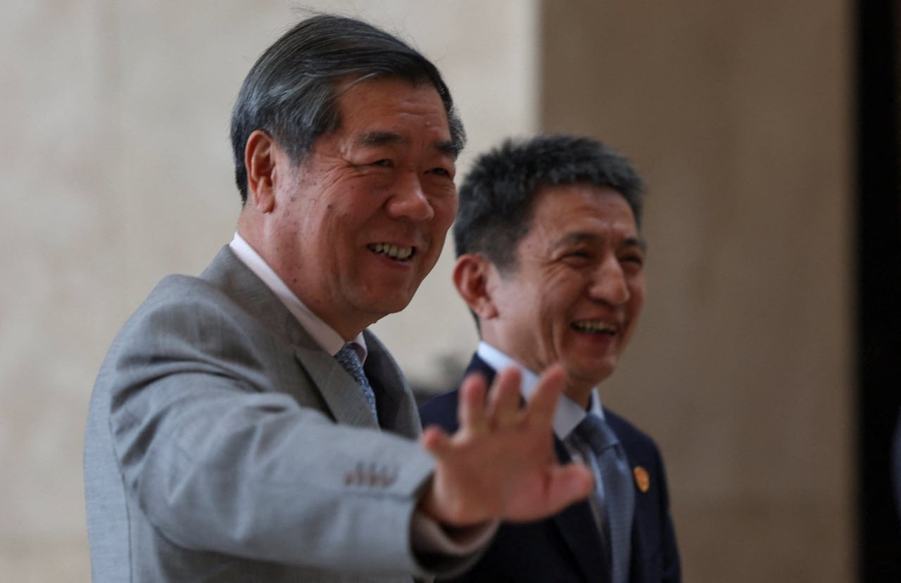 Hu Xiping, China vice premier (left), and Li Chenggang, ministerial-level vice minister and international trade negotiator, arrive at the US-China trade talks venue in Kuala Lumpur. /Courtesy of Yonhap News Hu Xiping, China vice premier (left), and Li Chenggang, ministerial-level vice minister and international trade negotiator, arrive at the US-China trade talks venue in Kuala Lumpur. /Courtesy of Yonhap News