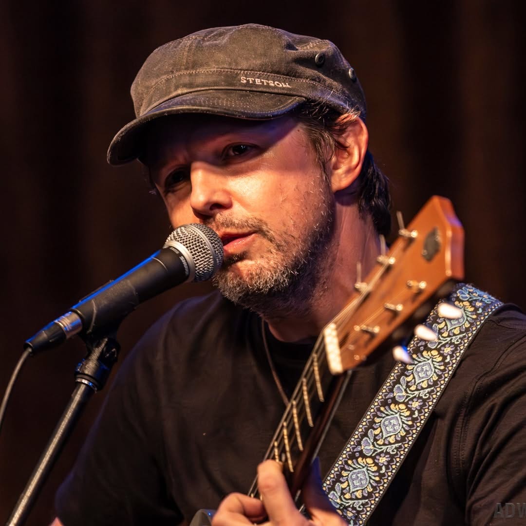 May be an image of guitar