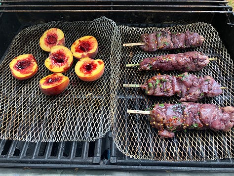 Grilled peaches, chicken, salmon, and delicious food