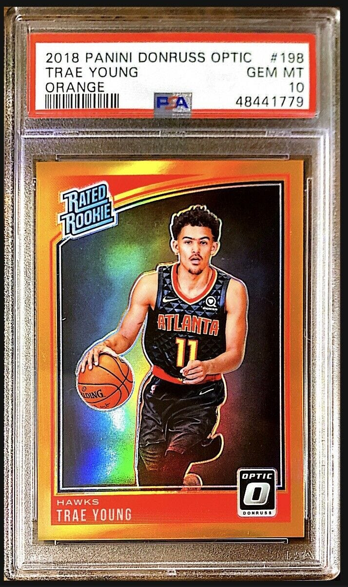 Image 1 - 2018 Donruss Optic Trae Young RC Orange Prizm #/199 PSA 10 Hawks Rookie