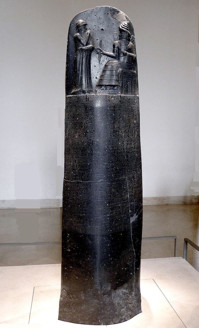 Photograph. The stele of the Code of Hammurabi in the Louvre Museum in Paris Photograph. The stele of the Code of Hammurabi in the Louvre Museum in Paris
