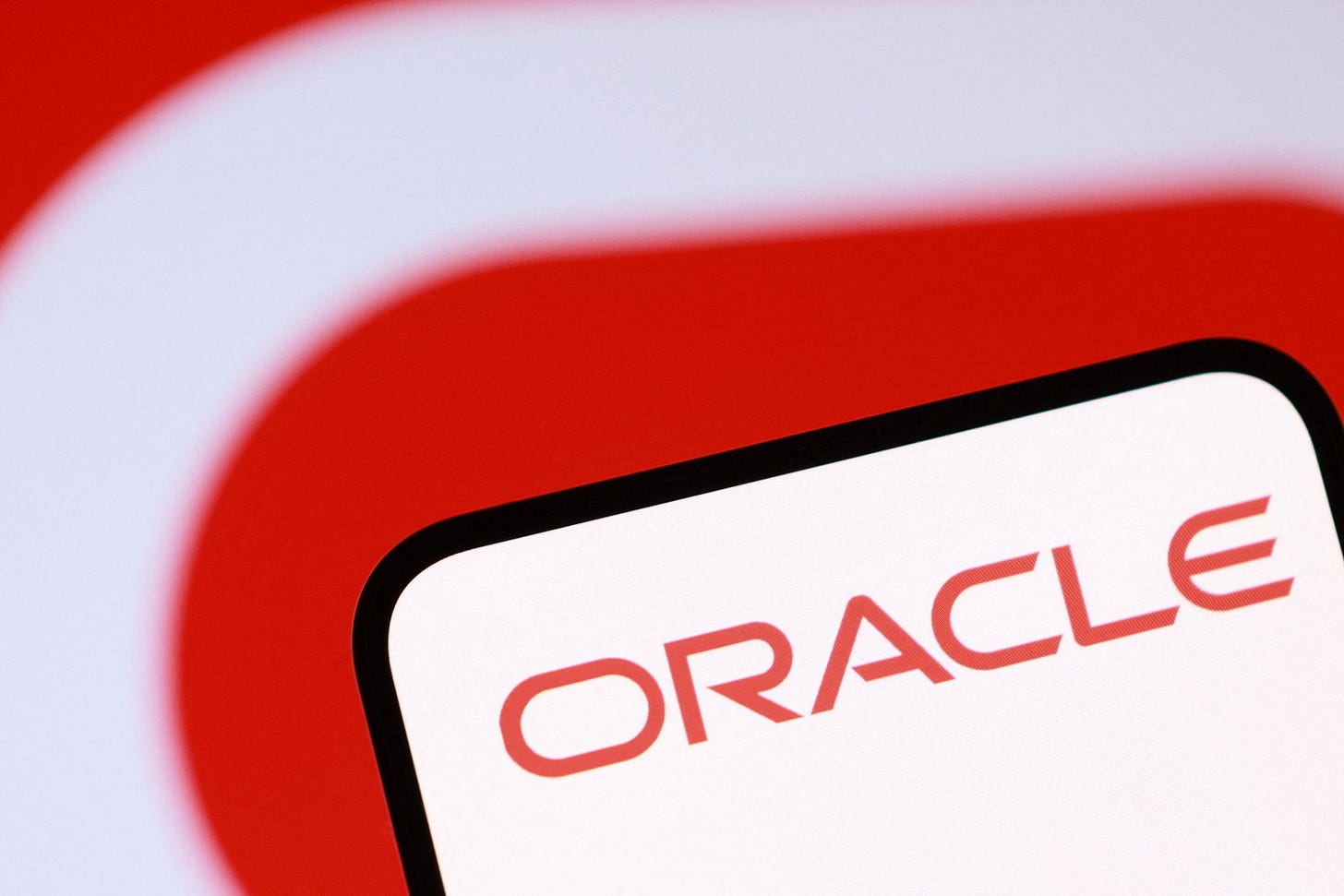 Illustration shows Oracle logo Illustration shows Oracle logo
