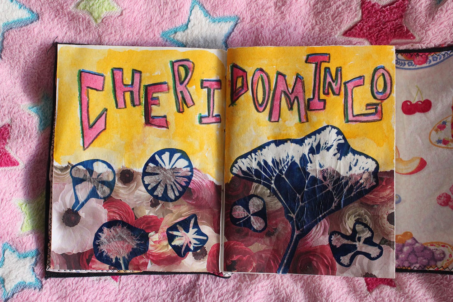 an art journal spread with the text "Cheridomingo" and floral motifs