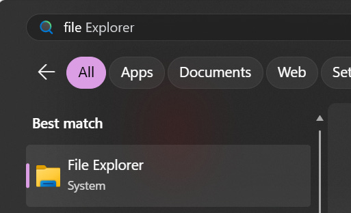 Windows search bar with "file Explorer" typed. The best match result shows "File Explorer" listed as a System application.