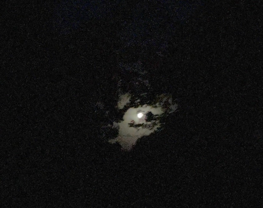 A moon in the sky

Description automatically generated