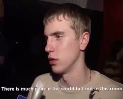 Man saying quote "There is so much pain in the world but not in this room"