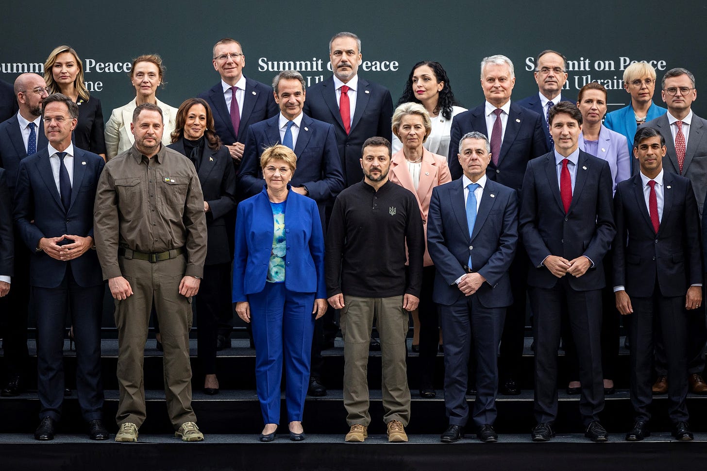 TOPSHOT - (First row - From L) Netherlands&#39;s Prime minister Mark Rutte, Ukraine Head of the presidential Office Andriy Yermak, Swiss Federal President Viola Amherd, Ukraine&#39;s President Volodymyr Zelensky, Swiss Foreign Minister Ignazio Cassis, Canada&#39;s Prime minister Justin Trudeau and British Prime Minister Rishi Sunak (Second row - From L) President of European Council Charles Michel, US Vice President Kamala Harris, Greece&#39;s Prime Minister Kyriakos Mitsotakis, President of European Commission Ursula von der Leyen, Lithuania&#39;s President Gitanas Nauseda, Denmark&#39;s Prime Minister Mette Frederiksen and Ukraine&#39;s Foreign Minister Kuleba Dmytro pose for a family photograph during the Summit on peace in Ukraine, at the luxury Burgenstock resort, near Lucerne, on June 15, 2024. World leaders from countries around the world gather in Switzerland this weekend to try to work out a way towards a peace process for Ukraine -- albeit without Russia. (Photo by MICHAEL BUHOLZER &#x2F; POOL &#x2F; AFP) (Photo by MICHAEL BUHOLZER&#x2F;POOL&#x2F;AFP via Getty Images) Photographer: MICHAEL BUHOLZER&#x2F;AFP