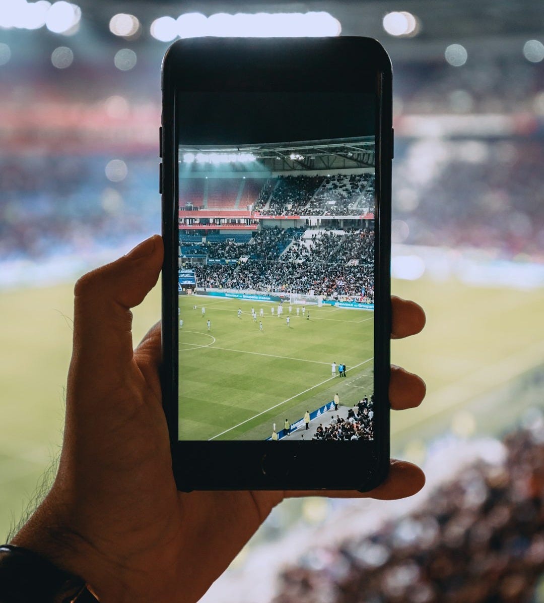 person taking photo using black smartphone