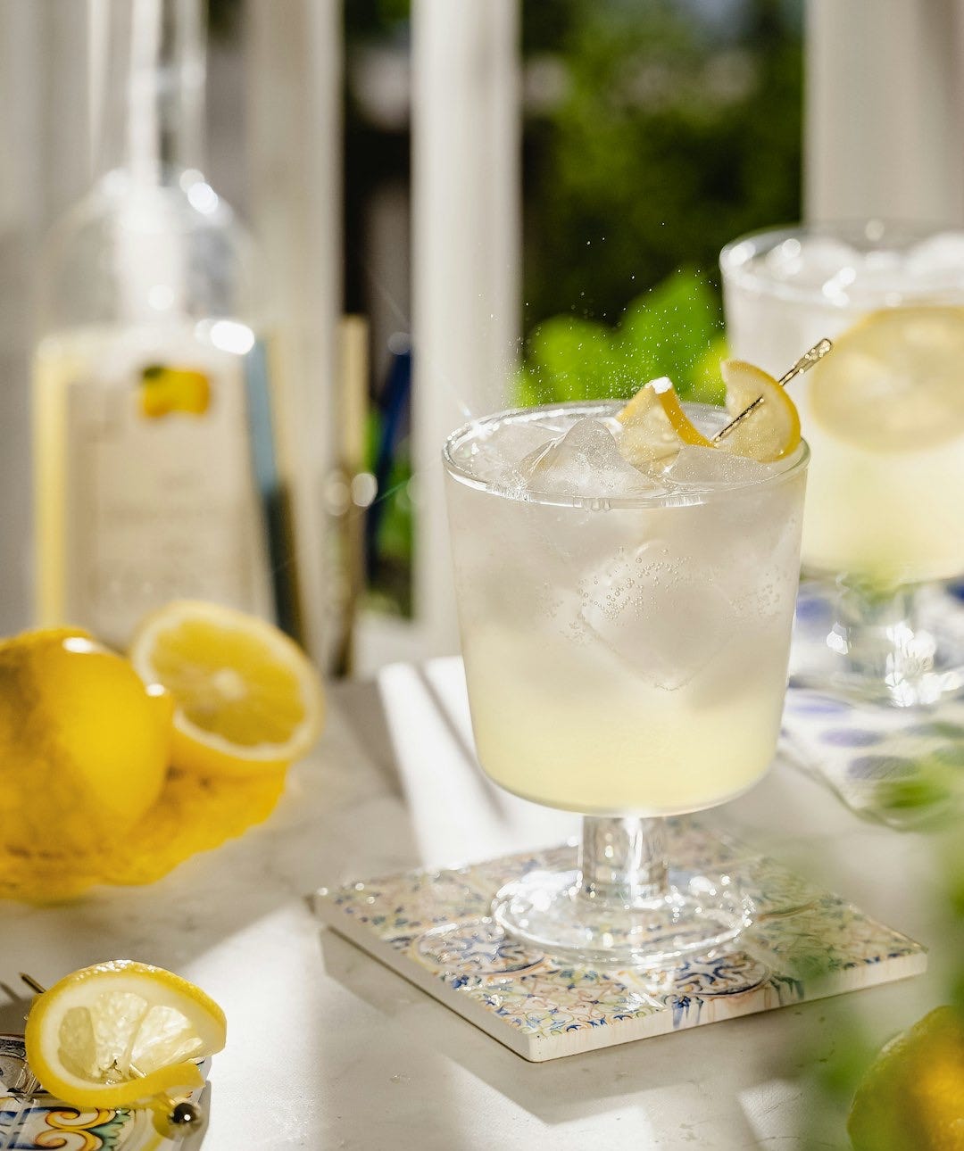 a glass of milk with lemons