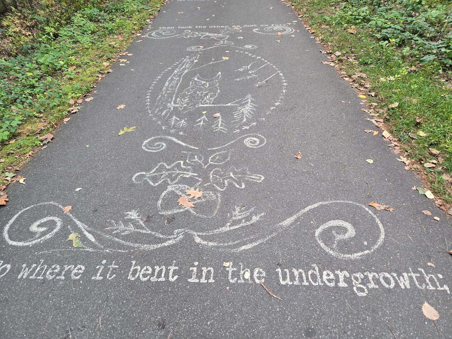 A poem stenciled on a walking trail.