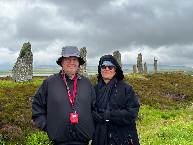 2025-6-26 John and Susan bundled up for the weather at the Ring of Brodgar, photo by Nikki Taylor