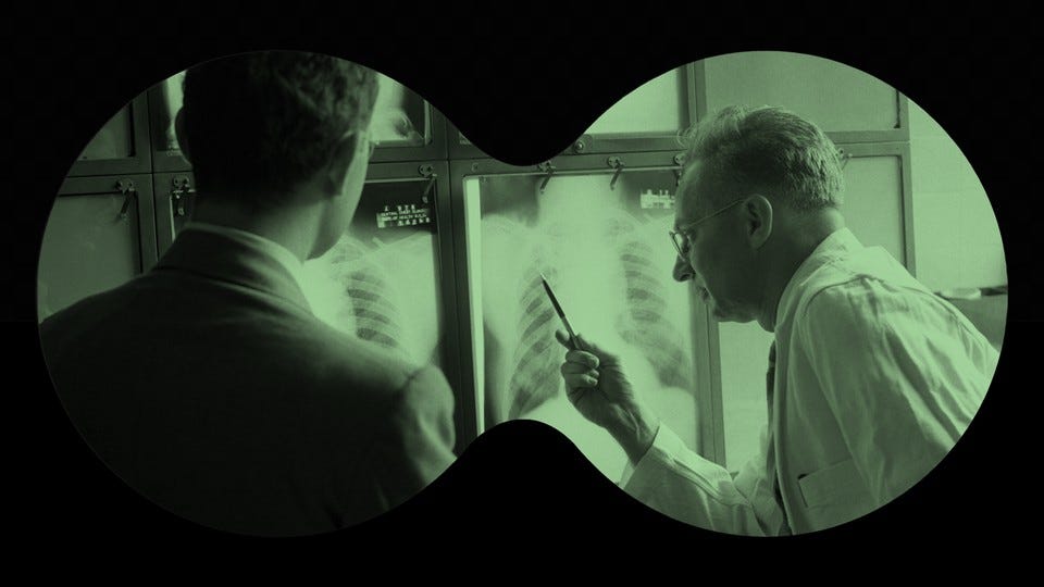 A doctor points to an X-ray as a man in a suit looks on, all framed by a cut-out of binocular-shaped lenses.
