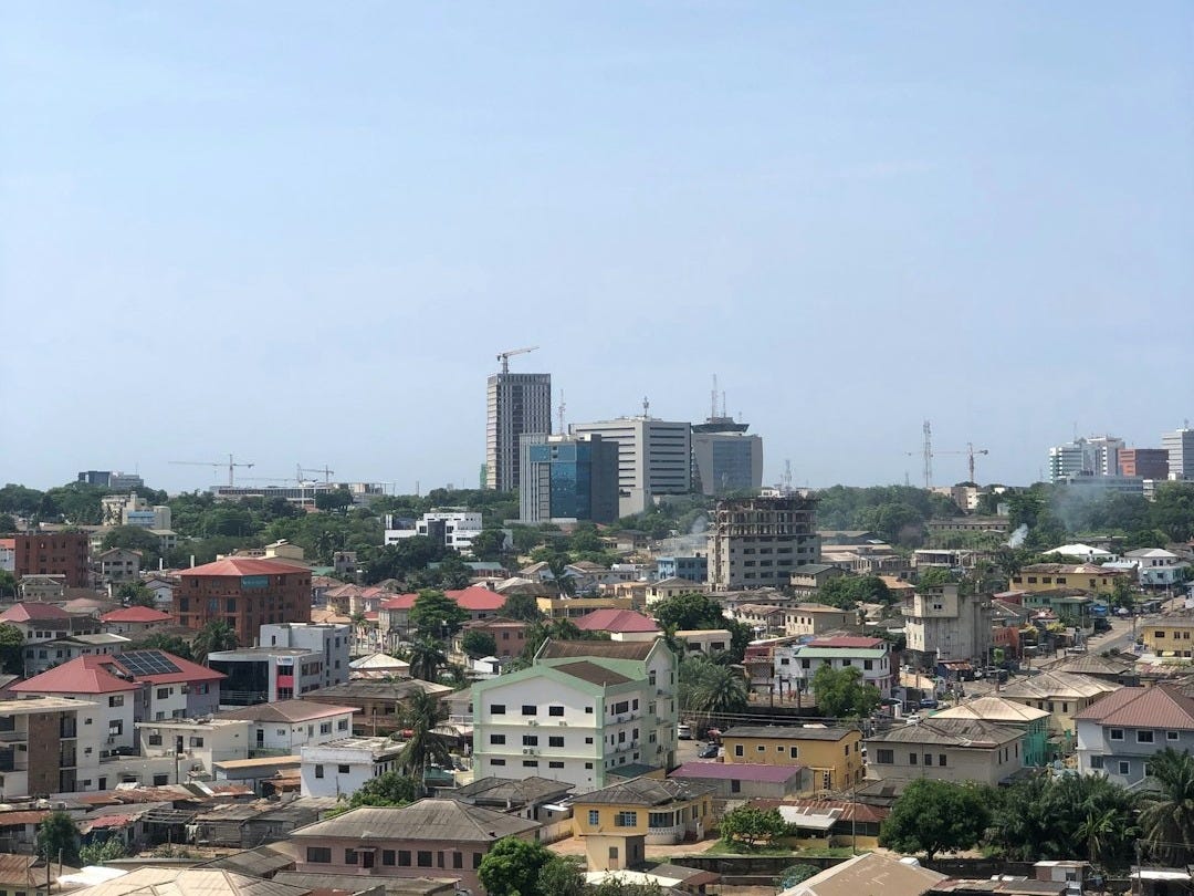 A view of a city from the top of a building